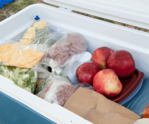 Have a good cooler packed up early with a variety of bars, drinks, chopped veggies, deli meat, cheese, hummus, and jerky.